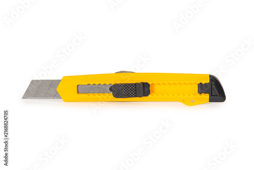 Konstfotografi Yellow stationery knife with retractable blade isolated on white background