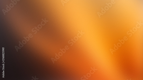 Abstract luxury glassmorphism background with blurred dark brown orange and yellow aura gradient waves in premium grainy holographic frosted glass texture design.