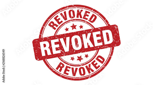 Distressed red rubber stamp featuring bold revoked text isolated on a plain textured white paper background