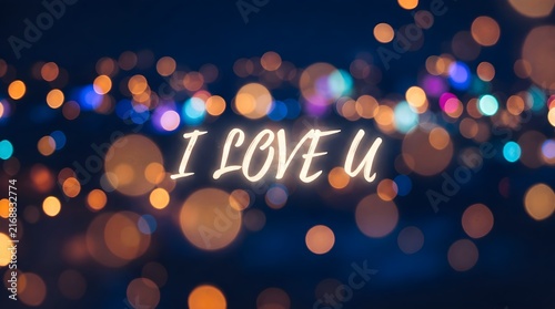 A romantic message displayed in a beautiful, blurry light background with bokeh effect