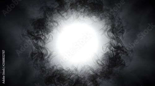 A bright light shines through a cloud of smoke in a dark background