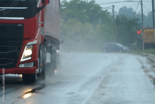 truck on a rain-soaked road