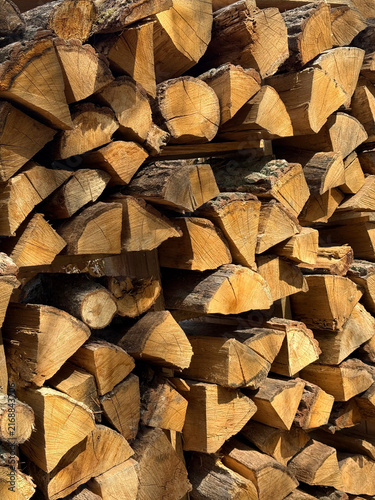 Woodpile stack of firewood pile of split logs
