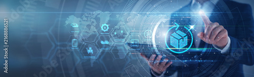 Supply planner pointing logistics tracking system. Manager using tab analyzing freight distribution routes and shipment status on hologram screen. Global supply chain and logistics.