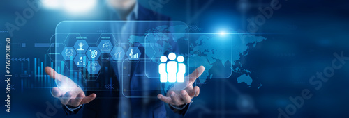 Leadership development mentor holding in hands strategy guides. Executive coach using virtual screen evaluating corporate culture metrics and team synergy dynamics. Management success.