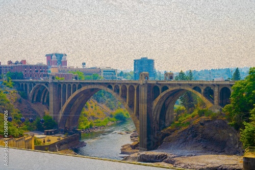 Monroe Street Bridge arch spanning Spokane Falls and Spokane River gorge in downtown Spokane Washington
