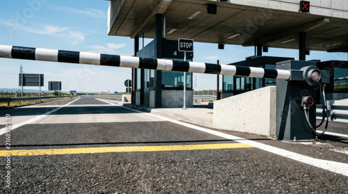 Automated Toll Booth Barrier On Modern Highway Entrance Under Clear Sky Capture