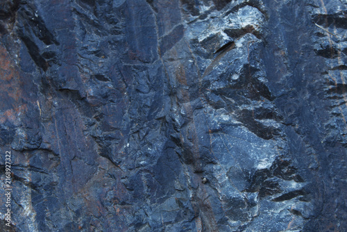Obraz na płótnie Deep blue slate rock texture with diagonal ridges and smooth fractured layers