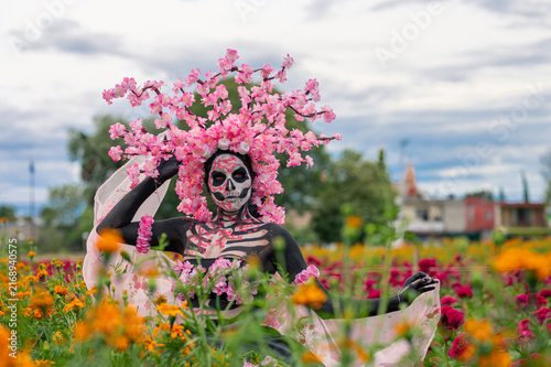 Catrina Behind Orange Flower Foreground, Cholula