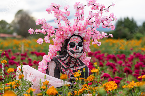 Catrina Looking Down in Cempasuchil Field