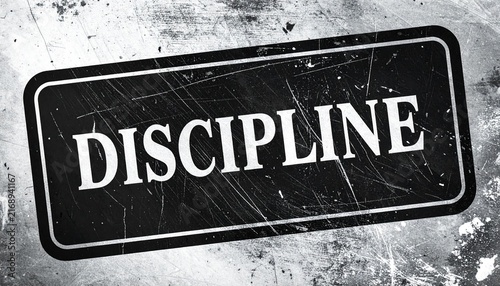 Black Distressed Rectangular Stamp Graphic with Bold White DISCIPLINE Text Tilted on Scratched Dark Background