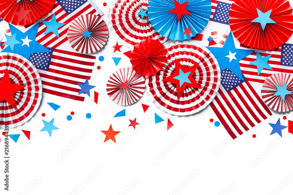 Fototapeta premium Fourth of July USA Independence Day festive celebration background with copy space. Handmade craft paper decorated fans with stars and stripes, USA flags