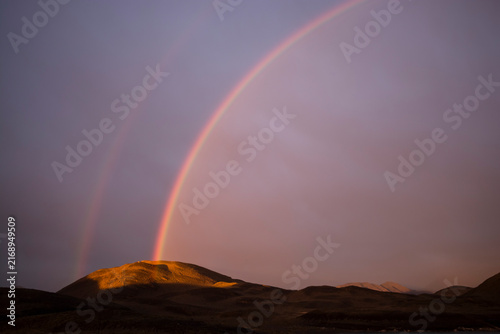 Rainbow in Mountain landscape environment, Torres del Paine National Park, Patagonia, Chile.