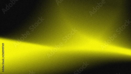 Photography Soft yellow glow spreads across dark background