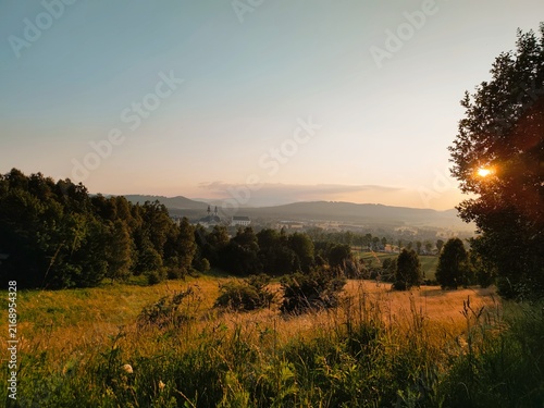 Obraz na płótnie Sunrise over rural meadow in Krzeszow, Poland