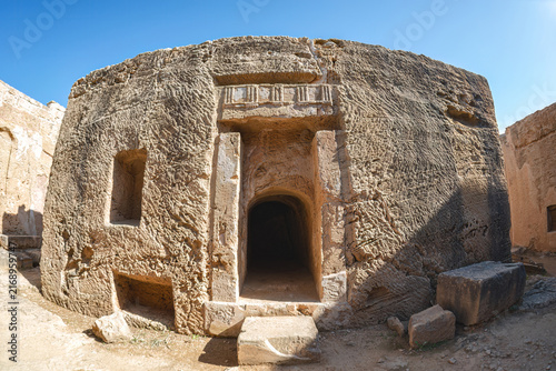Tomb entrance carved into rock at the Tombs of the Kings archaeological site in Paphos, Cyprus