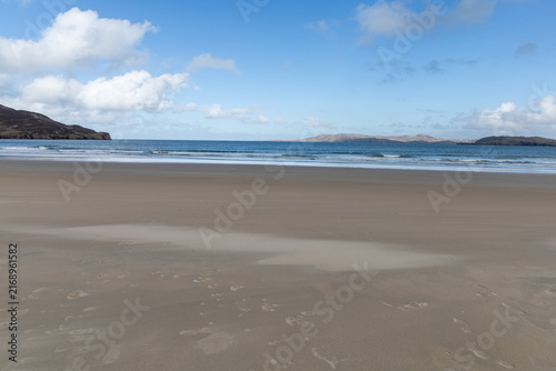 Crystal-clear turquoise waters meet pristine white sands at Killahoey Beach, Dunfanaghy, County Donegal