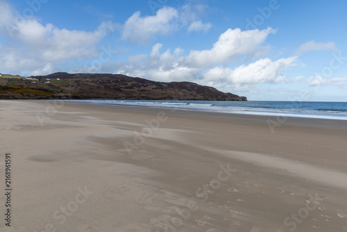 Crystal-clear turquoise waters meet pristine white sands at Killahoey Beach, Dunfanaghy, County Donegal