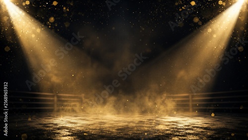 Dramatic arena stage illuminated by spotlights with golden particles, creating a captivating performance atmosphere.