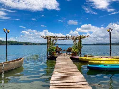 Wooden Dock and Kayaks on Lake Petén Itzá in Flores, Guatemala