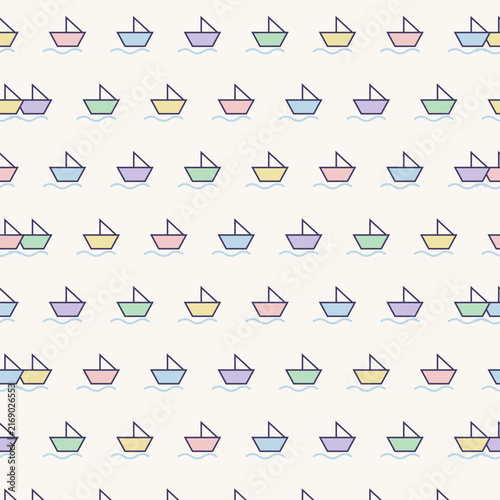 Seamless paper boat and wave pattern in pastel colors