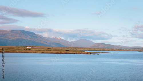 фотографія Wide waterfront views of Reykjavik’s harbours, piers and shoreline buildings cap