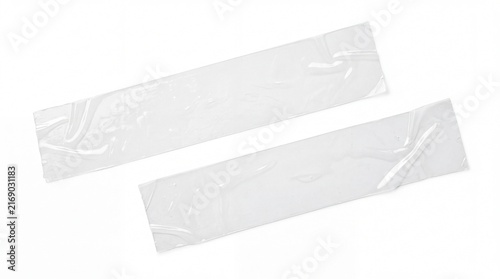 Two strips of clear adhesive tape with wrinkled texture