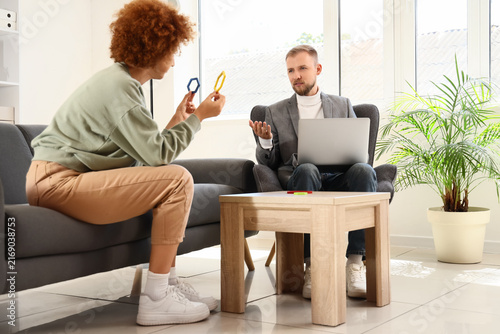Therapy and mental health support, woman talking to a male psychologist or co...
