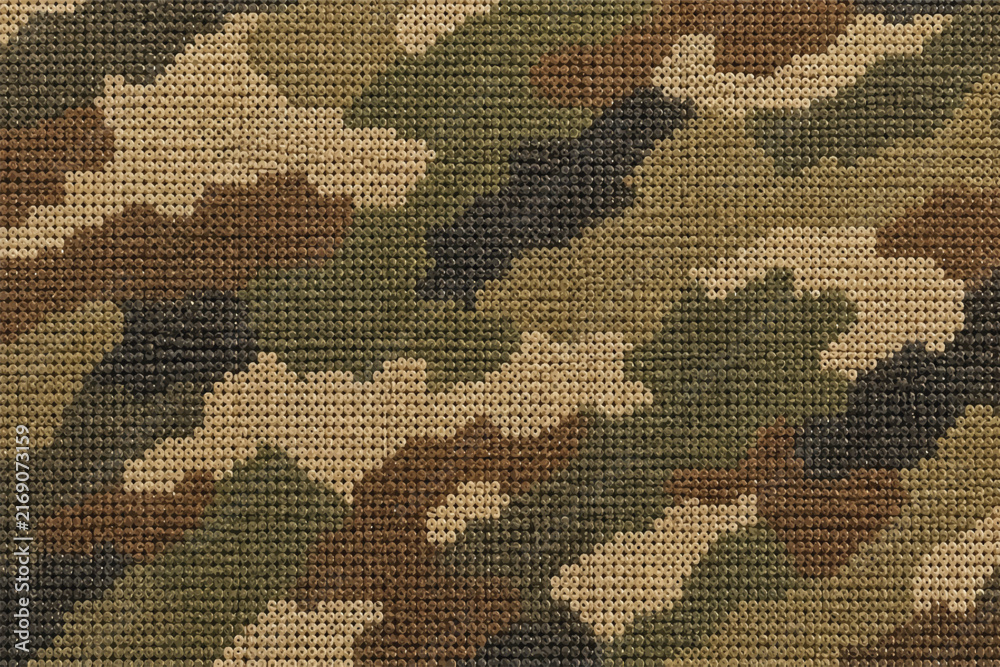 Fototapeta premium Seamless military woodland camouflage fabric texture background, knitted camo textile pattern