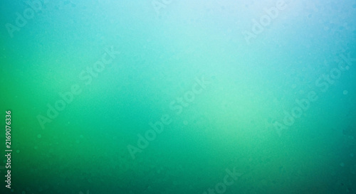 A smooth vibrant gradient background transitions from teal to bright green creating a calming visual effect