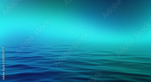 An abstract representation of teal and blue hues blending together evoking a calm watery scene