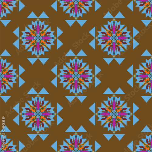 Stunning fabric design featuring chocolate brown background with bright blue triangles and colorful orange magenta brown floral elements perfect for fashion apparel and holiday textile decoration