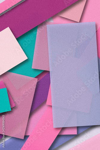 A pile of folded paper squares in magenta, turquoise, and lilac overlaps with crisp shadows, creating a playful background for promotions and design work.