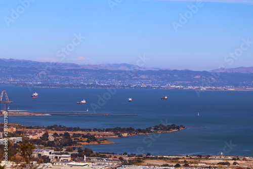 Fotografie Serene Bay and Distant Hills 2