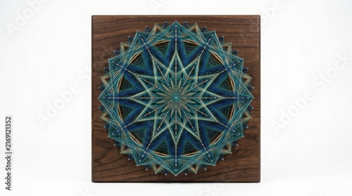 Wooden square plaque featuring an intricate blue and green mandala carving geometric pattern wood art intricate design laser cut wall decor sacred geometry flower of life spiritual symbol