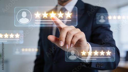 Professional Businessman Interacting With Digital Customer Rating Interface and Five Star Review Concept for Customer Satisfaction and Business Reputation