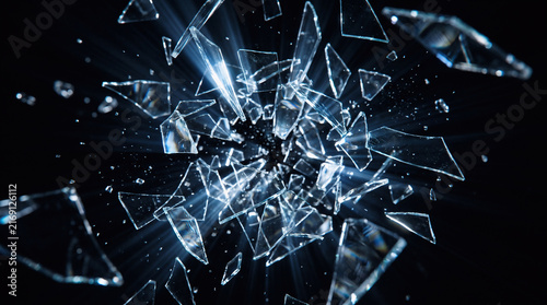 sharp shards of broken glass exploding violently through the air, hundreds of crystal fragments suspended in dynamic motion