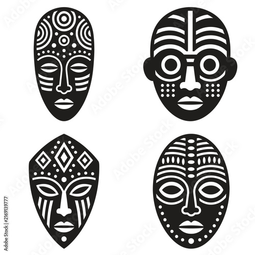 Set of four black and white tribal african masks with geometric patterns