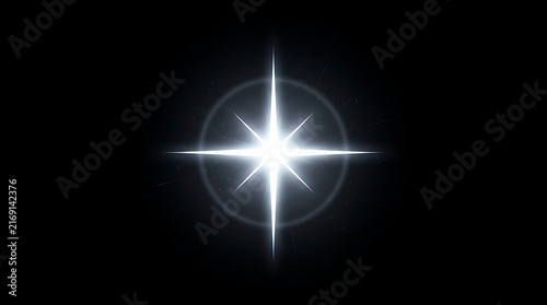 Bright white starburst with glowing light rays on a dark black background