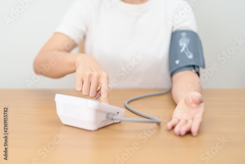 Cuadro en lienzo woman checking Blood pressure by Blood pressure monitor with Cuff