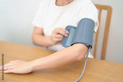 Cuadro en lienzo woman checking Blood pressure by Blood pressure monitor with Cuff