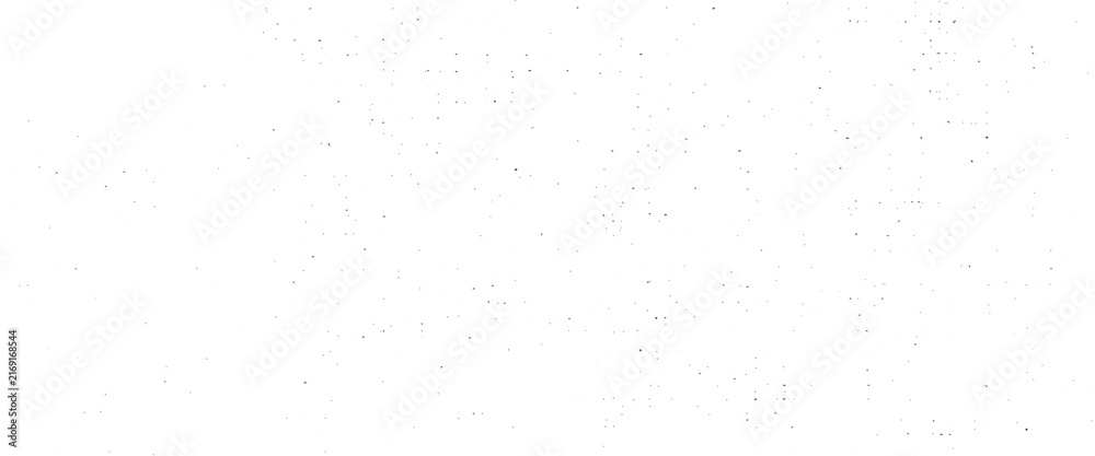 Naklejka premium Black dots scattered on a white background with subtle gray speckles