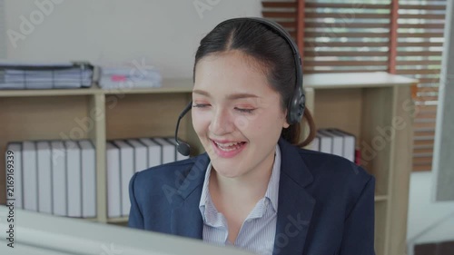 Asian female call center agent providing customer service