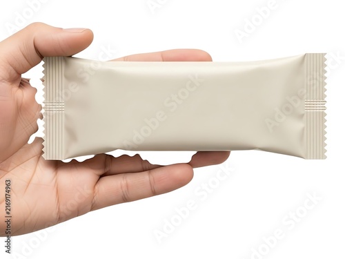 A hand holding a blank snack bar packaging mockup on a white background