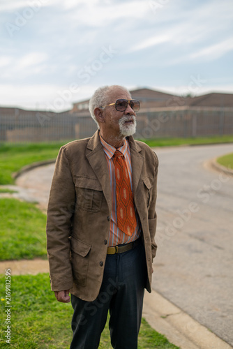 Portrait of stylish senior man seen outdoors