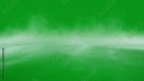 Freezing White Vapor Flowing Across Ground on Green Screen