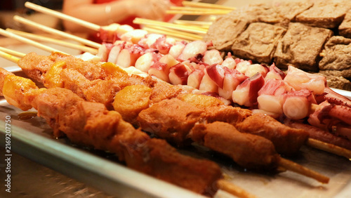 Obraz na płótnie Assorted Street Food Skewers Displayed at a Market in Hong Kong