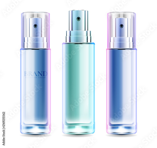 Three sleek glass spray bottles of cosmetic products on transparent background