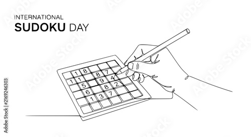 Hand solving Sudoku puzzle with pencil, International Sudoku Day concept