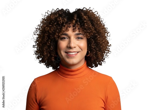 Portrait of a smiling young woman with curly hair on a white background